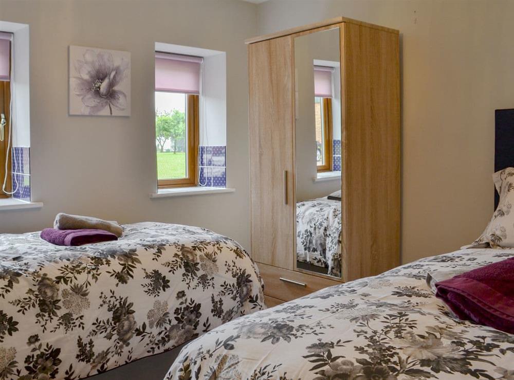 Light and airy twin bedroom at Koi Keep, 