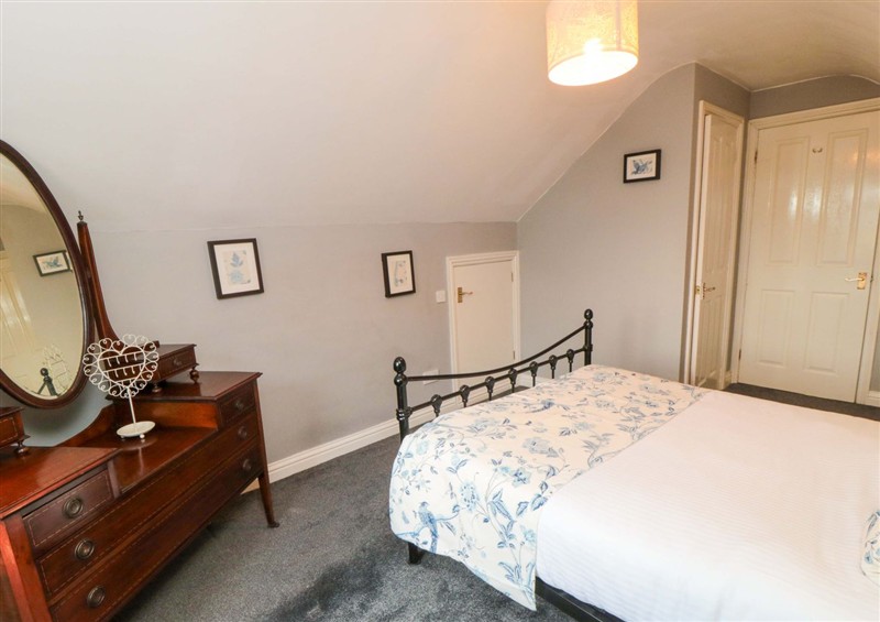 This is a bedroom (photo 2) at Walnut Cottage, Helmsley