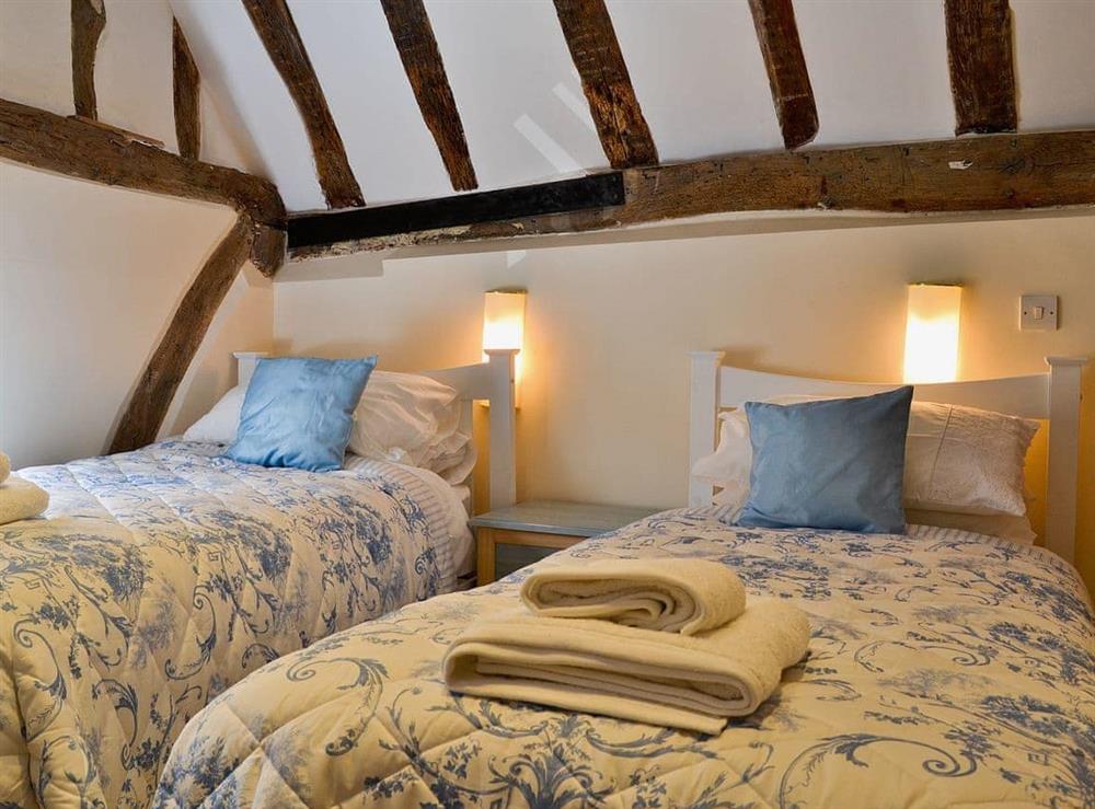 Twin bedroom at Walnut Cottage in Sproughton, Suffolk