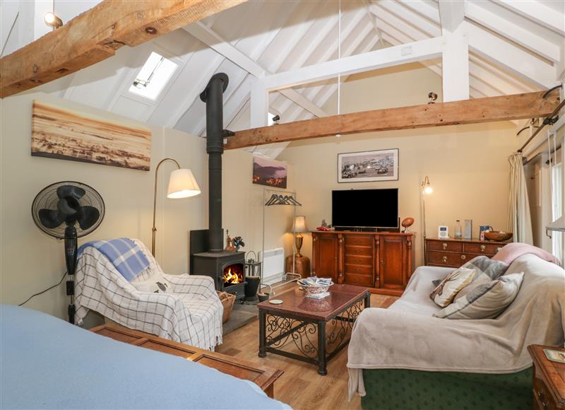 Relax in the living area at Walnut Cottage, Yatton near Ross-On-Wye