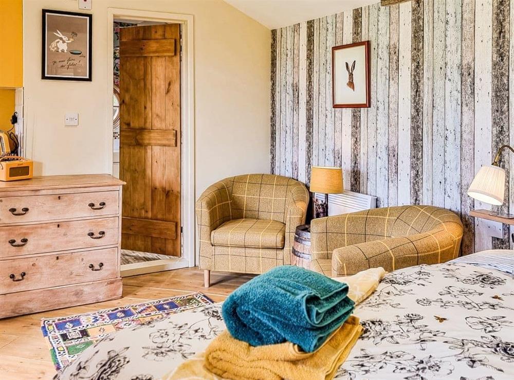 Open plan living space at Walnut Lodge in Launcherley, near Wells, Somerset