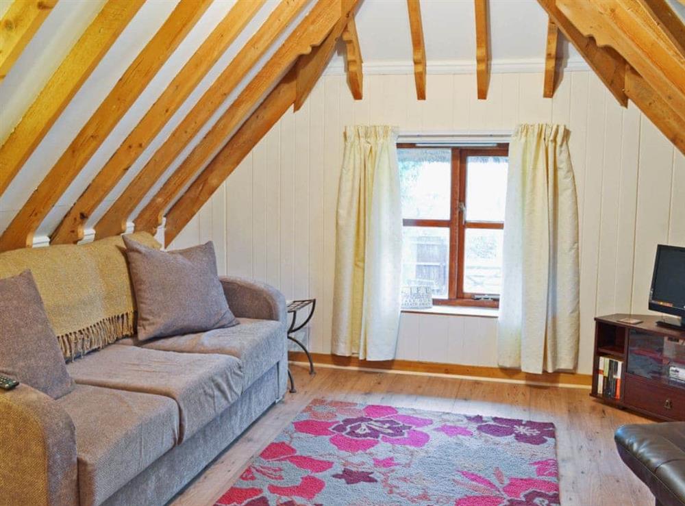Living room at Walnut Tree Cottage in Burgate, near Fordingbridge, Hampshire