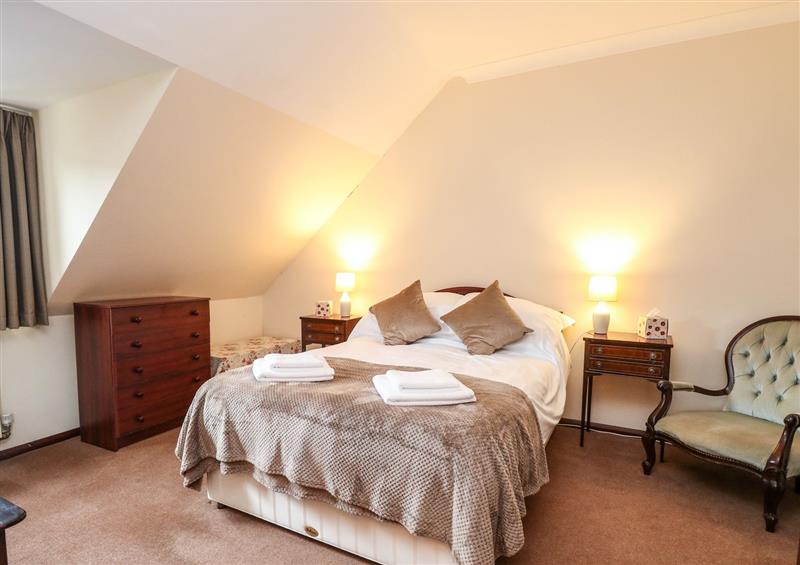 One of the bedrooms at Walnut Tree Cottage, Catfield