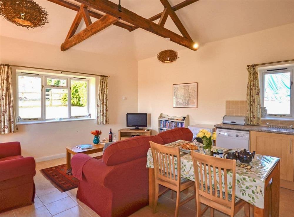Enjoy the living room at Walnut Tree Cottage in Patching, West Sussex