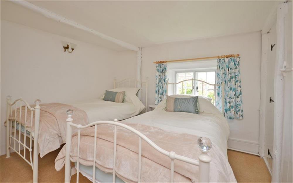 Twin bedroom at Walnut Tree Cottage in Tiptoe
