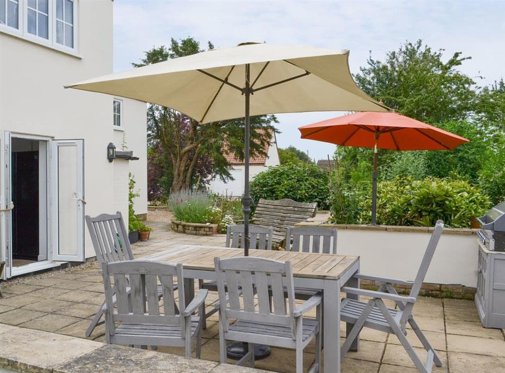 Paved patio area with outdoor area at Walnut Tree House in Tilney St Lawrence, near King’s Lynn, Norfolk