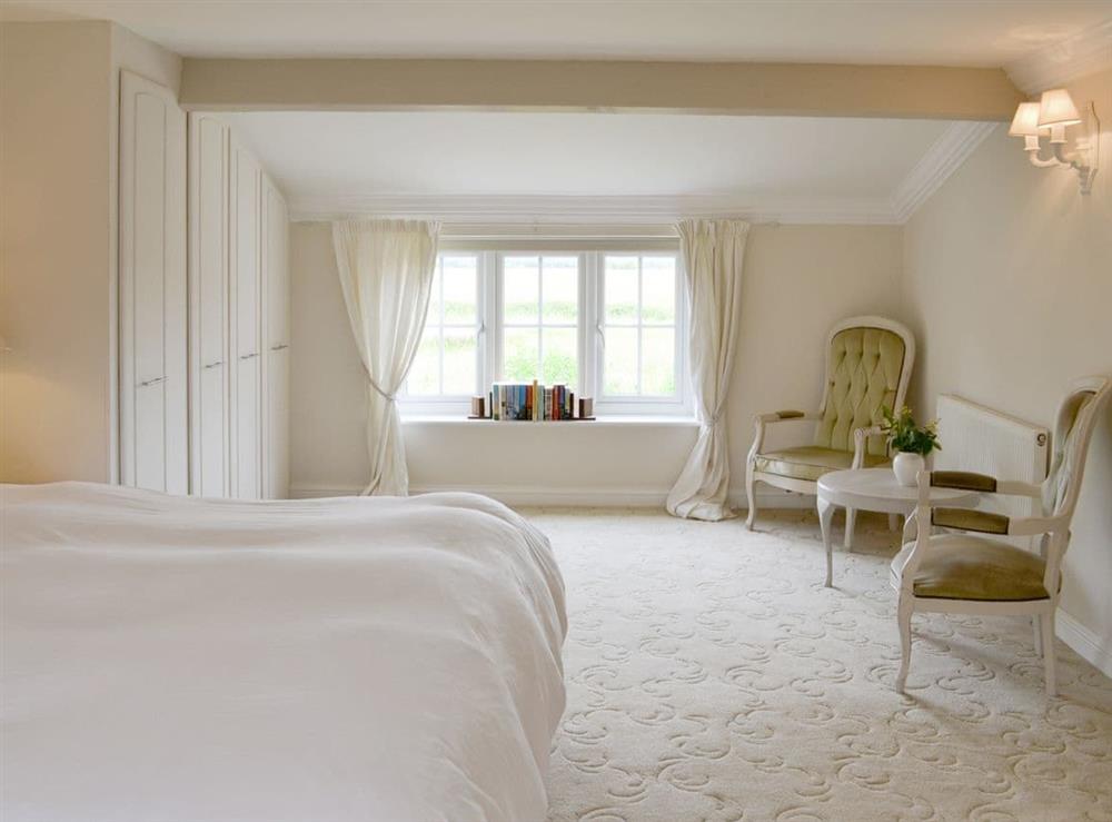 Spacious master bedroom at Walnut Tree House in Tilney St Lawrence, near King’s Lynn, Norfolk