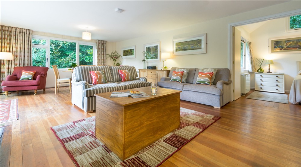 The open plan sitting and dining room at Warcleave Cottage in Newton Abbot, Devon