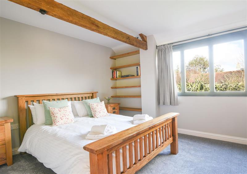 One of the 3 bedrooms at Ware Barn Cottage, Ware near Lyme Regis