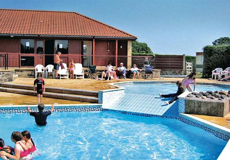 Outdoor heated dual level swimming pool at Waren Park in , Bamburgh