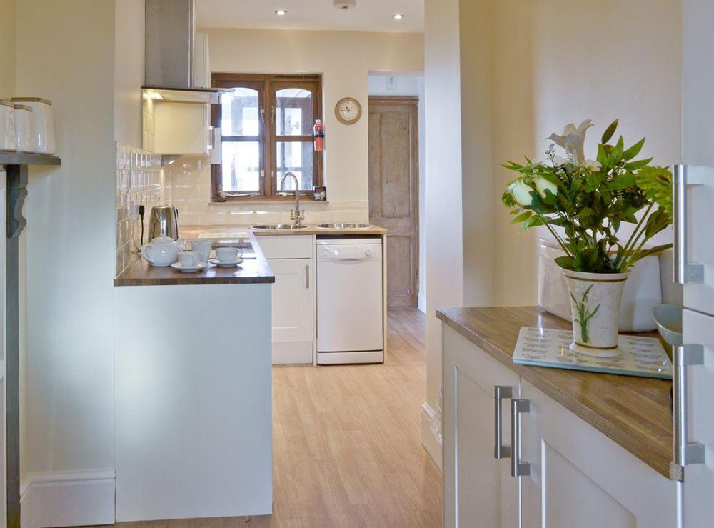 Contemporary fitted kitchen at Warleigh Lodge in Tamerton Foliot, near Plymouth, Devon