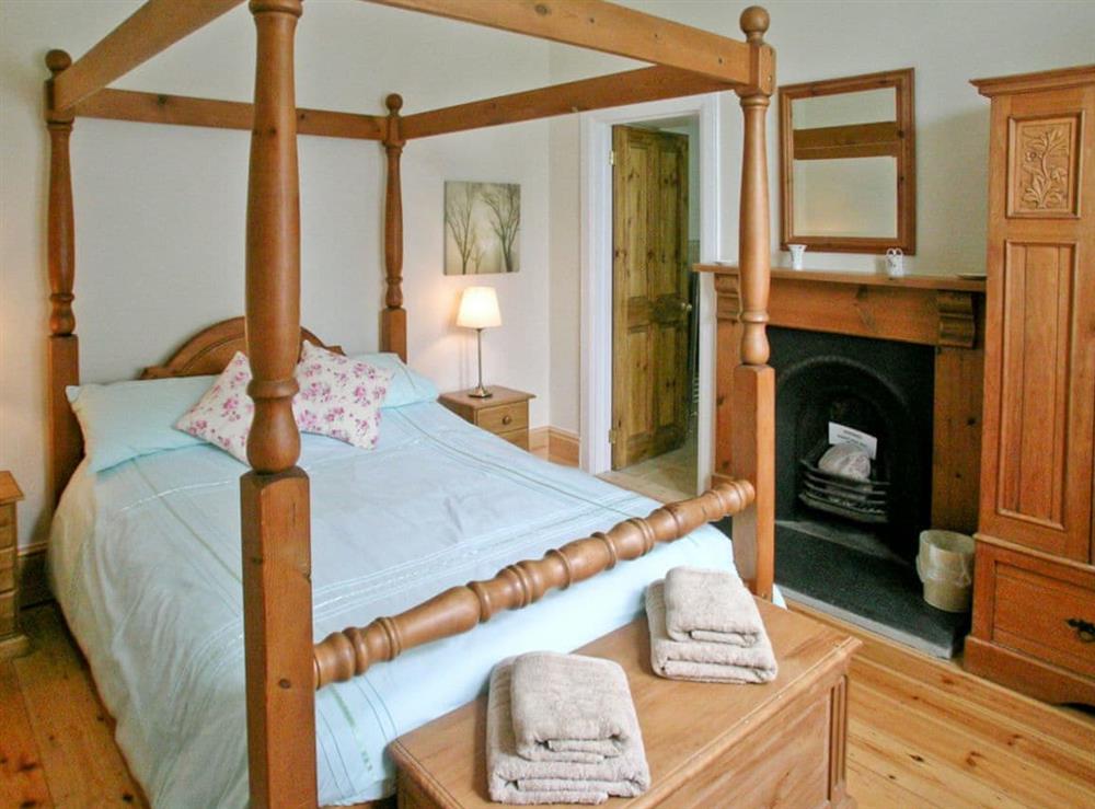 Four Poster bedroom at Warleigh Lodge in Tamerton Foliot, near Plymouth, Devon