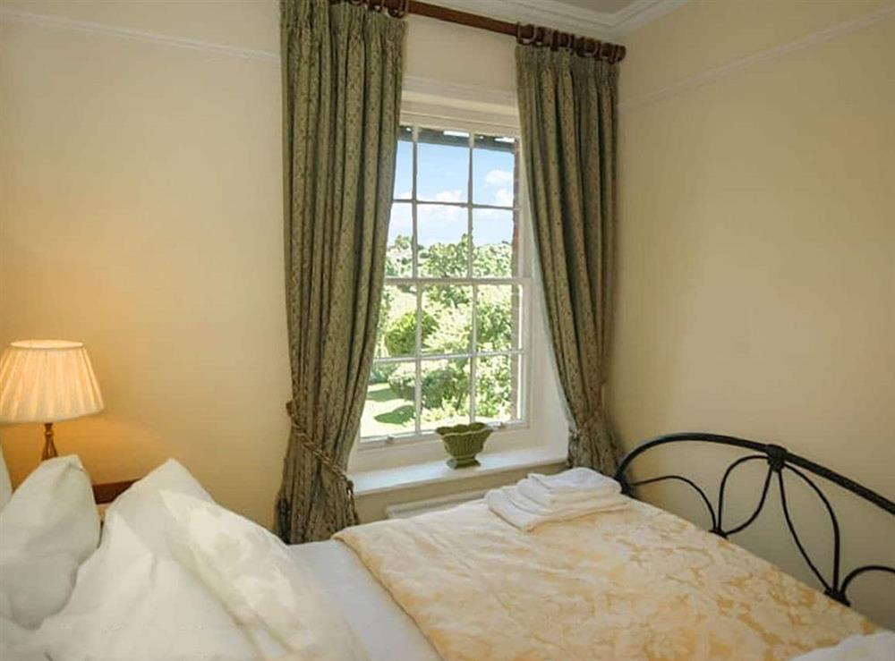A bedroom in Warre Cottage at Warre Cottage in Burpham, West Sussex