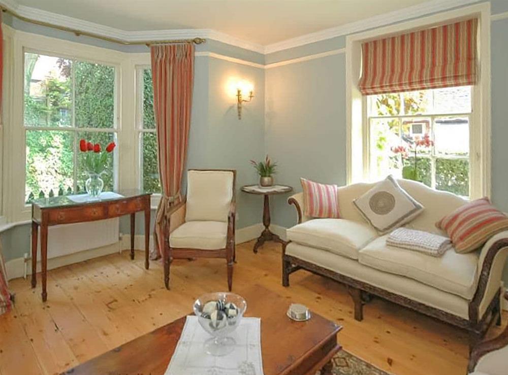 Enjoy the living room at Warre Cottage in Burpham, West Sussex