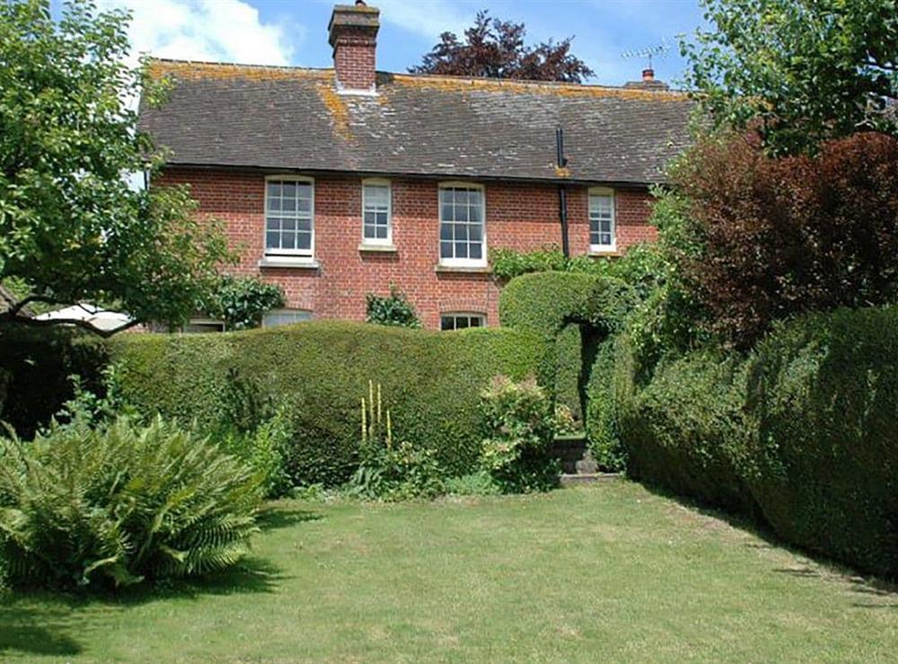 The setting of Warre Cottage at Warre Cottage in Burpham, West Sussex