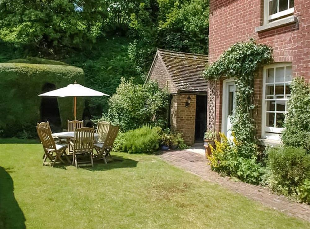 This is the setting of Warre Cottage at Warre Cottage in Burpham, West Sussex