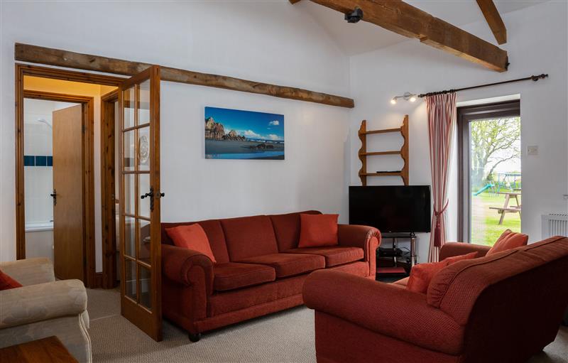 Enjoy the living room at Warren Cottage, Torrington