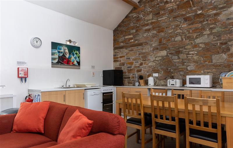 Relax in the living area at Warren Cottage, Torrington