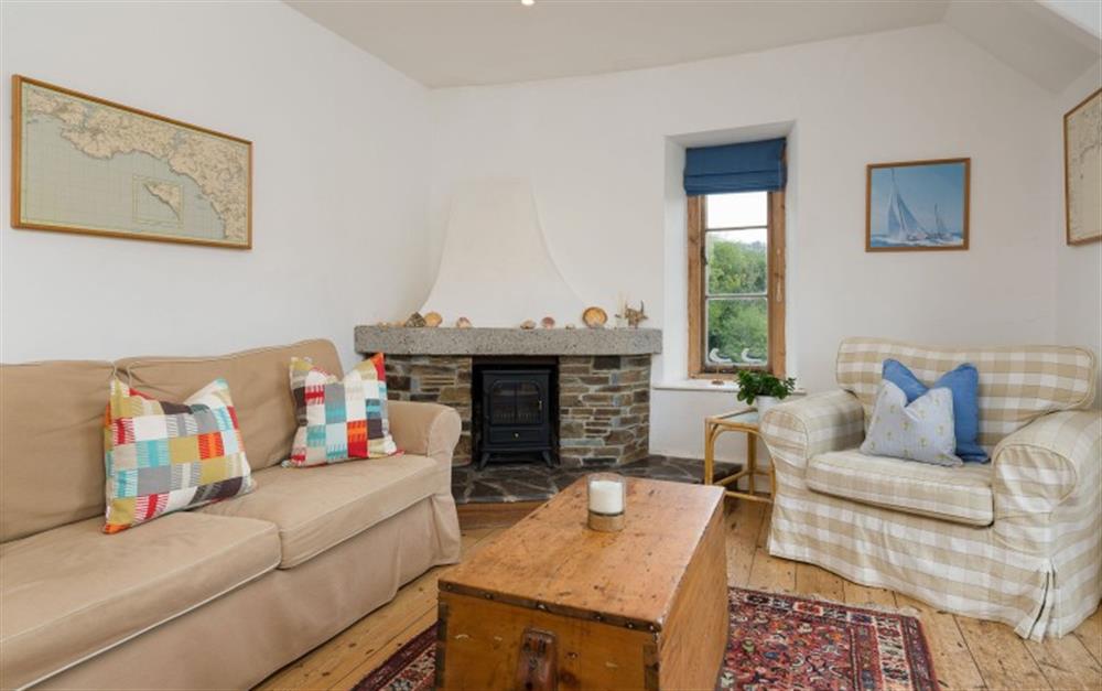 Lounge overlooking the water at Warren Point Cottage in Newton Ferrers