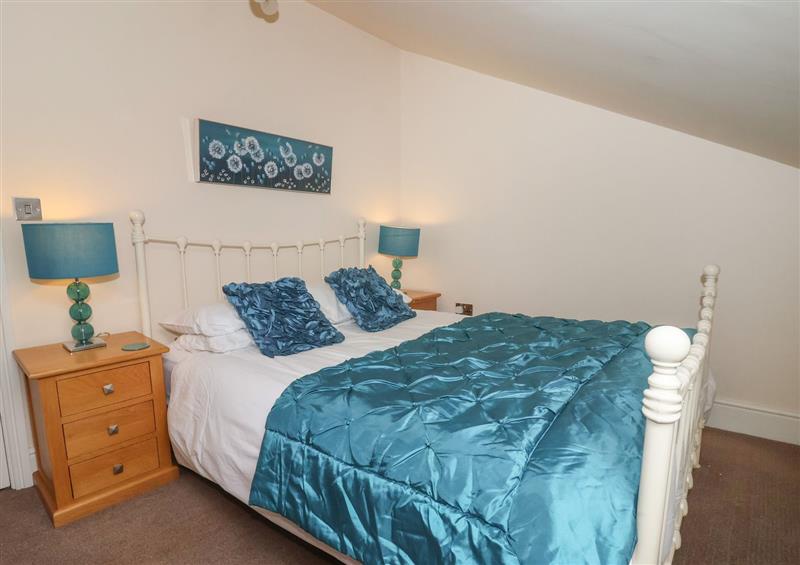This is a bedroom (photo 2) at Warwick Apartment, Scarborough