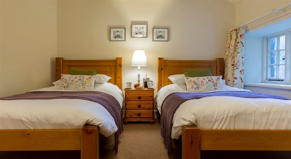 The twin bedroom at Wasdale Hall Lodge in Gosforth, Cumbria