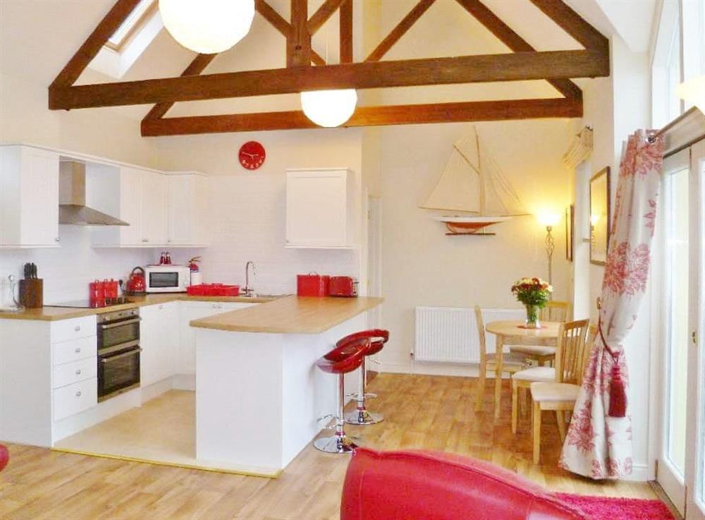 Convenient open plan kitchen area at Watch House in Fowey, Cornwall