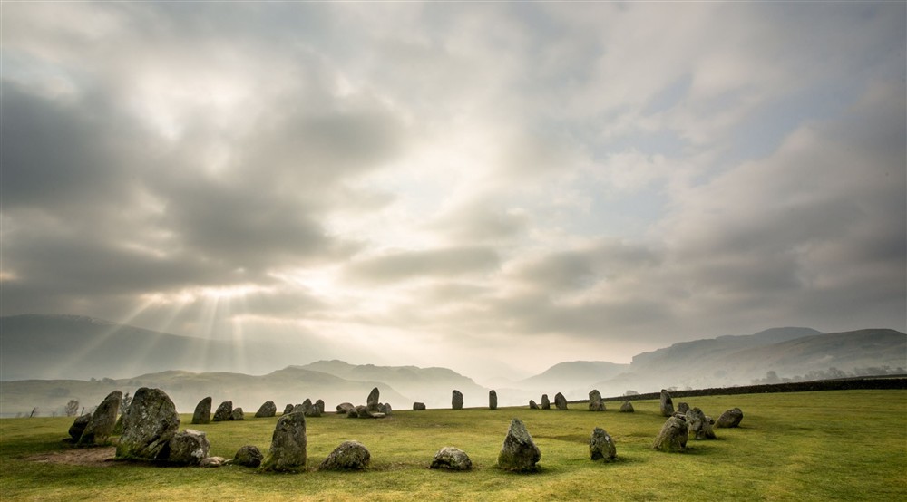 Castlerigg Stone Circle in winter, Borrowdale, Cumbria. Surrounded by the fells of Skiddaw and Blencathra to its north and Castlerigg Fell, High Rigg and Clough Head to its south, this ring of 38 stones, set within a ring of mountains, has stood at Watend