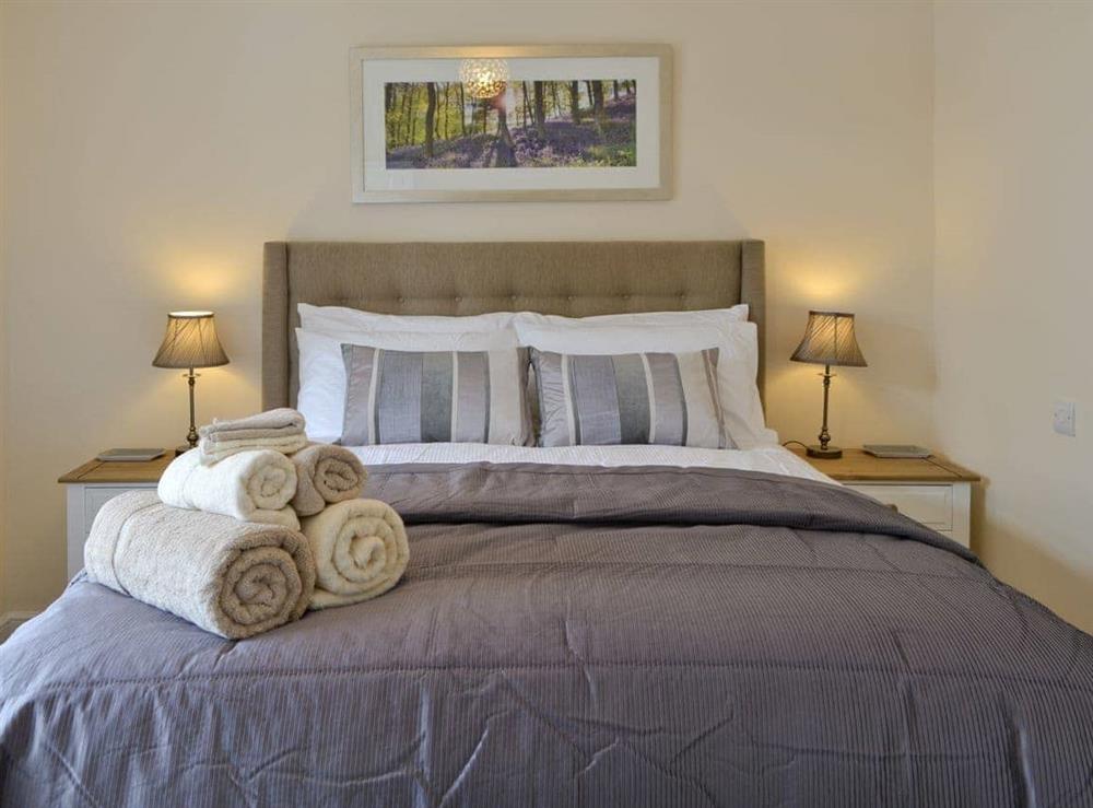 Stylish master bedroom at Water Howes Cottage in Ambleside, Cumbria