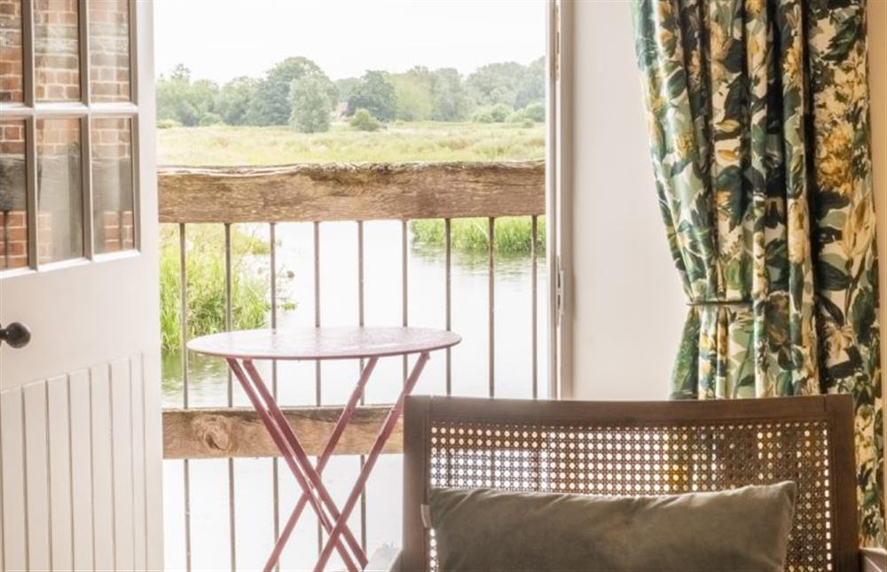 Enjoy first floor views over the river at Water Mill House, Burnham Overy Staithe near Kings Lynn