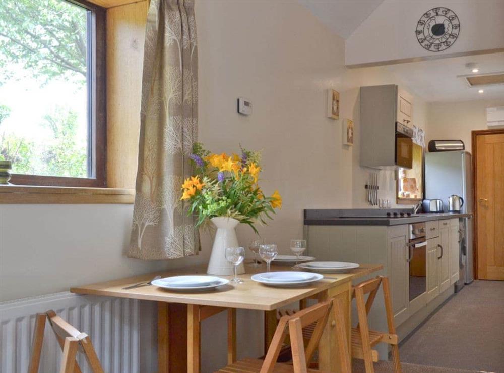 Dining area at Waterfall Cottage in Lumsdale, Tansley Wood, near Matlock, Derbyshire