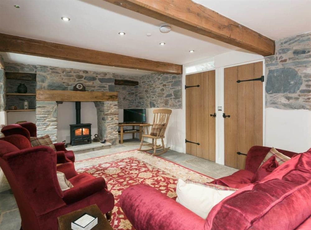 Charming, cosy living room at Waterfall Wood Cottage in Glenridding, near Keswick, Cumbria