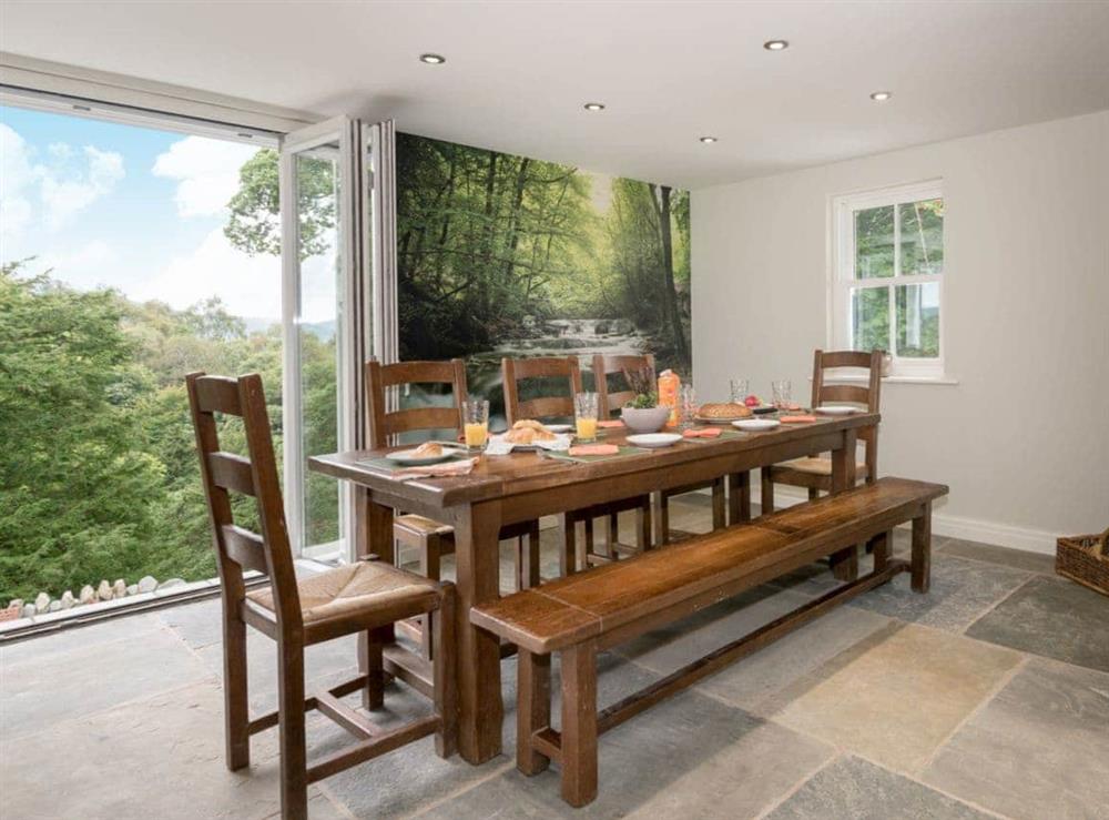 Wonderful dining area with views of the surrounding area at Waterfall Wood Cottage in Glenridding, near Keswick, Cumbria
