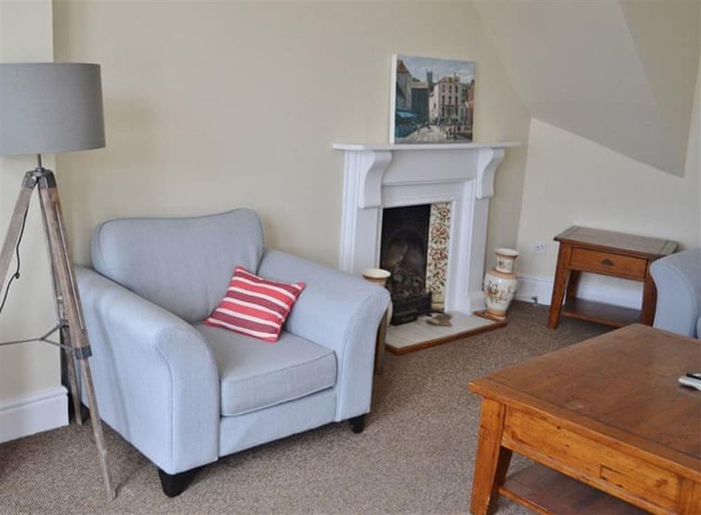 The comfortable and spacious sitting room (photo 2) at Waterfront Apartment in Fowey, Cornwall