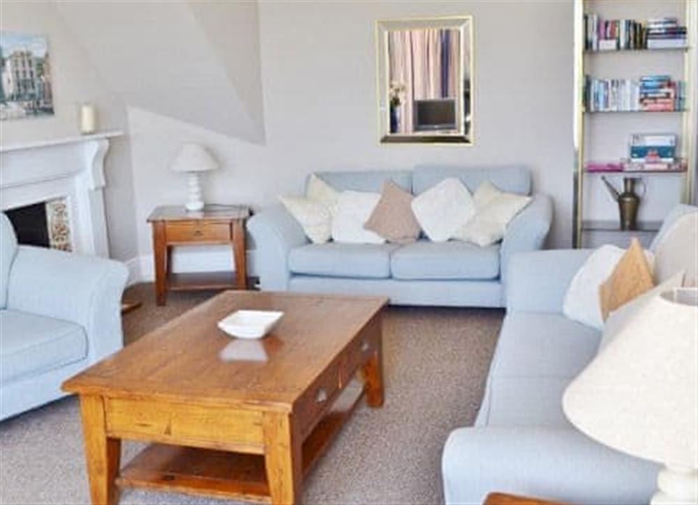 The comfortable and spacious sitting room at Waterfront Apartment in Fowey, Cornwall