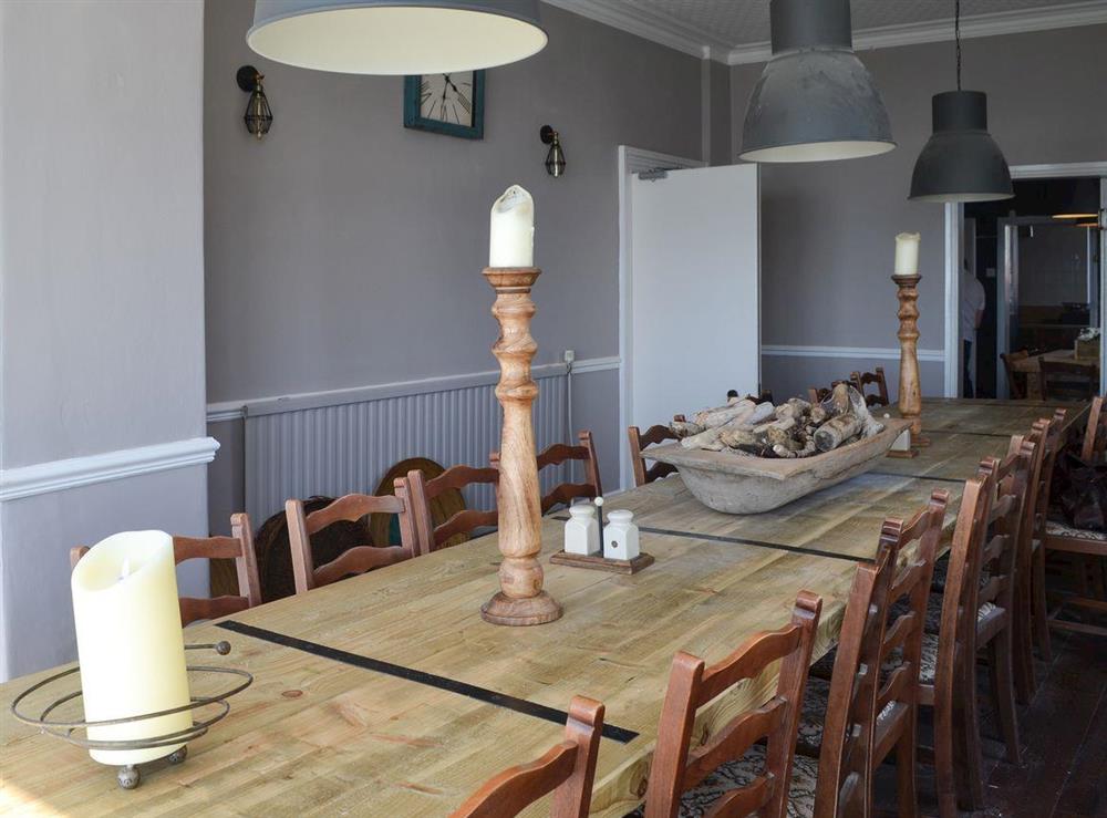 Dining area at Waterfront Beach House in Criccieth, near Porthmadog, Gwynedd