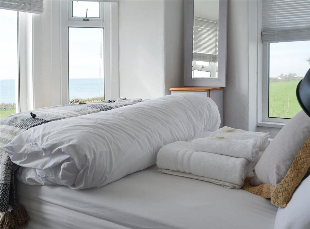 Double bedroom with sea views at Waterfront Beach House in Criccieth, near Porthmadog, Gwynedd