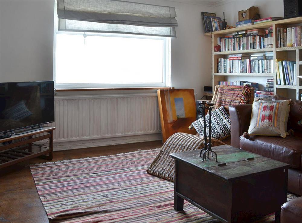 Sitting room with TV at Waterfront Beach House in Criccieth, near Porthmadog, Gwynedd