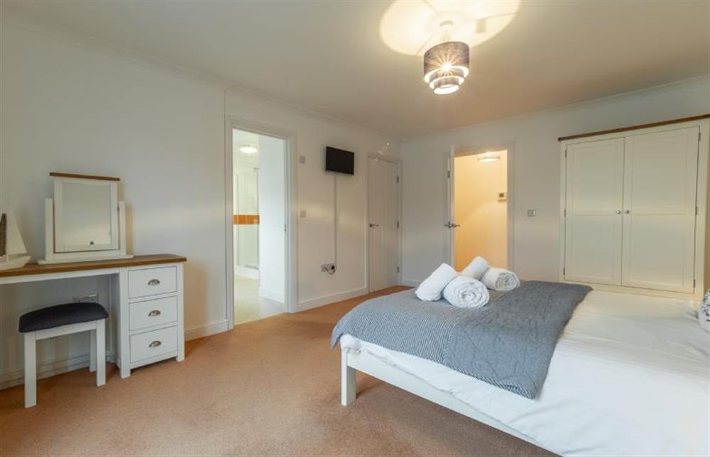 Bedroom one with en-suite shower room at Waterfront House, Malpas, Truro 