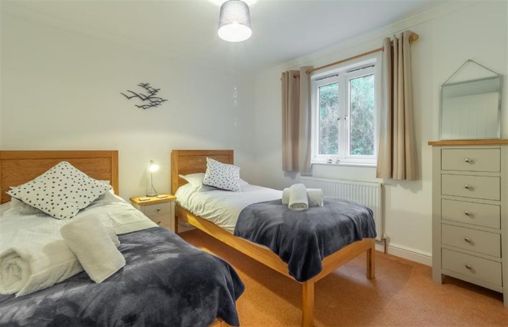 Bedroom three with twin single beds at Waterfront House, Malpas, Truro 