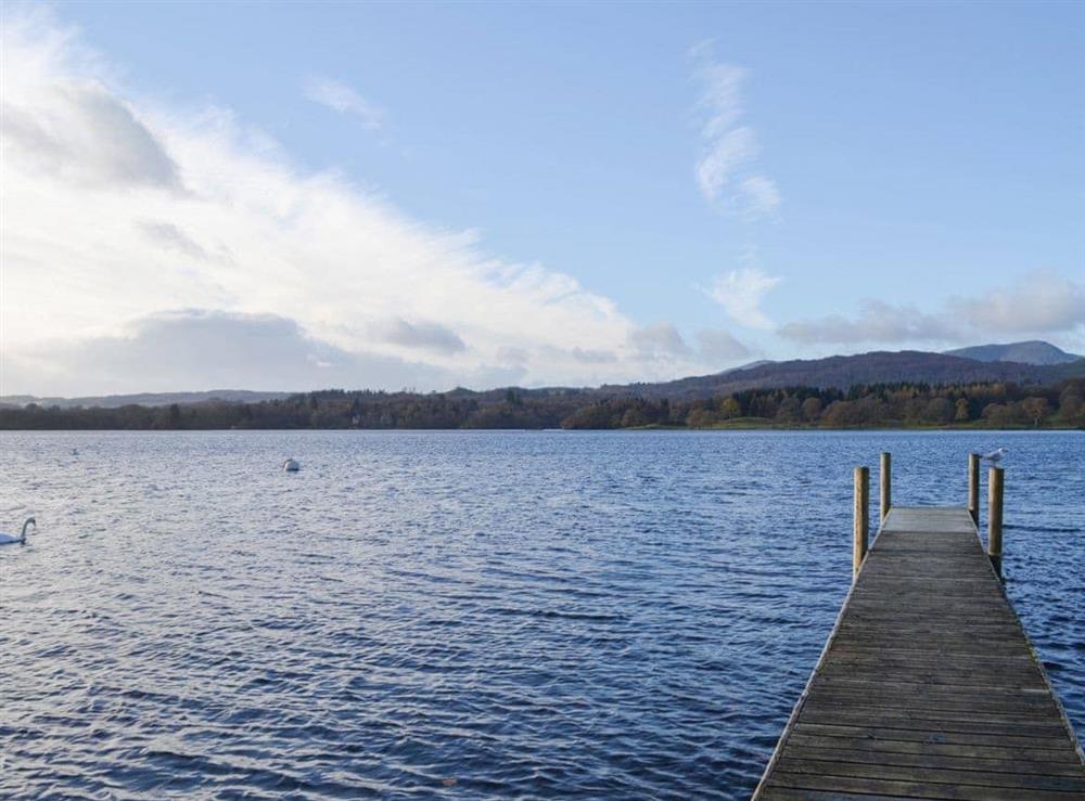 Shared jetty and lakeside seating area at Waterhead Studio in Nr. Ambleside, Cumbria