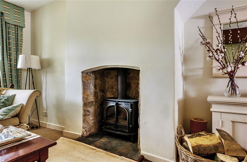 Relax in the living area at Waterloo Mill Cottage, Wotton-Under-Edge