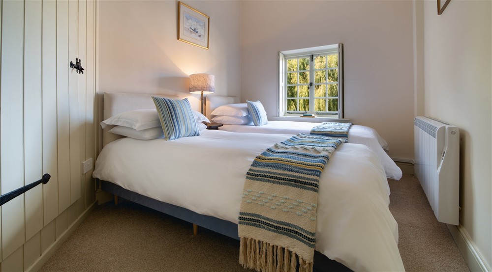 The twin bedroom at Watermill Apartment in Burnham-overy-staithe, Norfolk