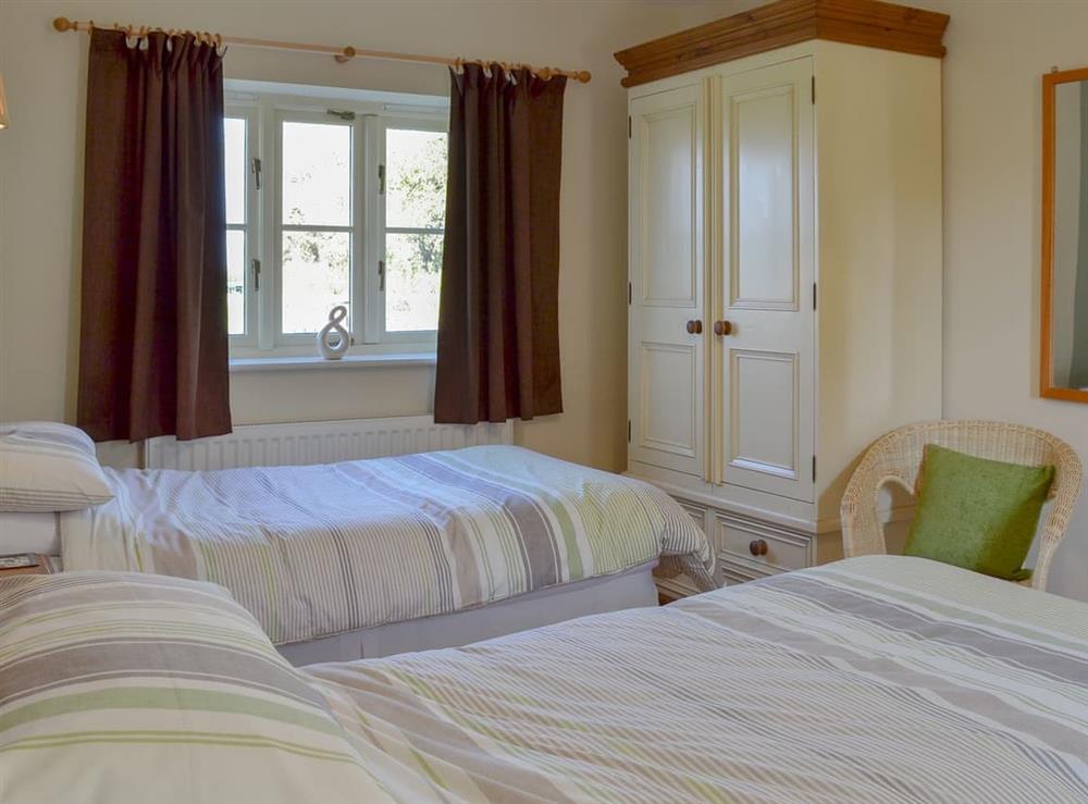 Comfortable twin bedroom with en-suite (photo 2) at Watermill Cottage in Chester, Cheshire
