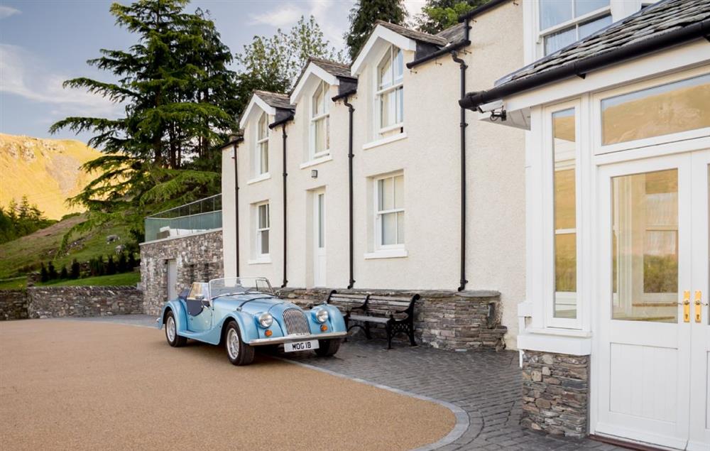A sweeping drive leads up to Waternook at Waternook, Ullswater