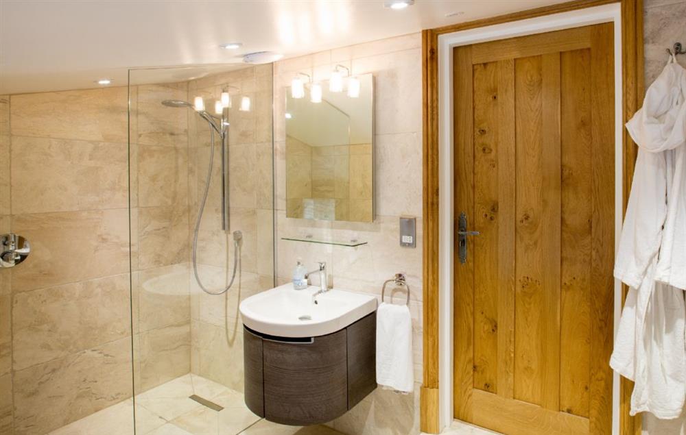 First floor: Boredale - en-suite natural black stone shower room with monsoon and raindrop showers, a Lake View balcony and private access to Waternook's Spa and Wellness Sanctuary