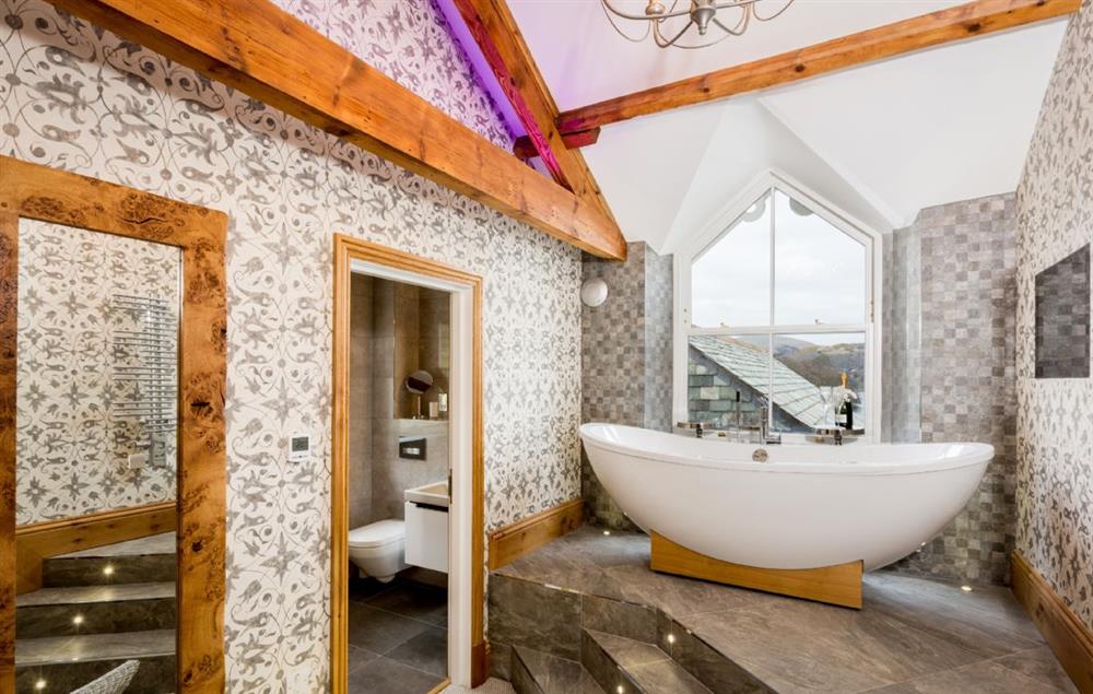 First floor: Pikeawassa - en-suite natural stone bathroom with raised bath and separate monsoon and raindrop showers