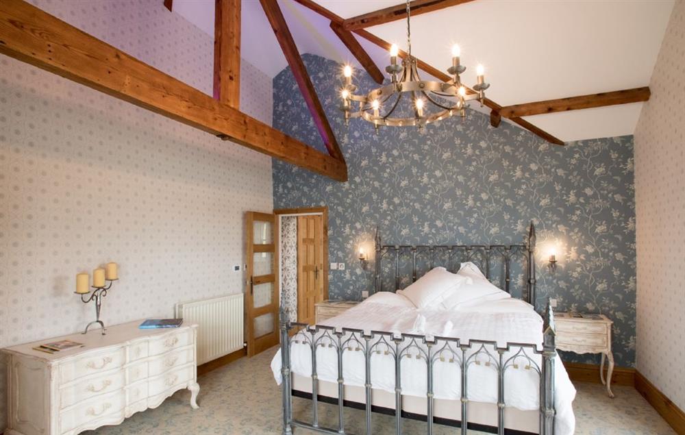 First floor: Pikeawassa has a 6' super king bed with Vispring Elite mattress and en-suite natural stone bathroom with raised bath and separate monsoon and raindrop showers (photo 2)
