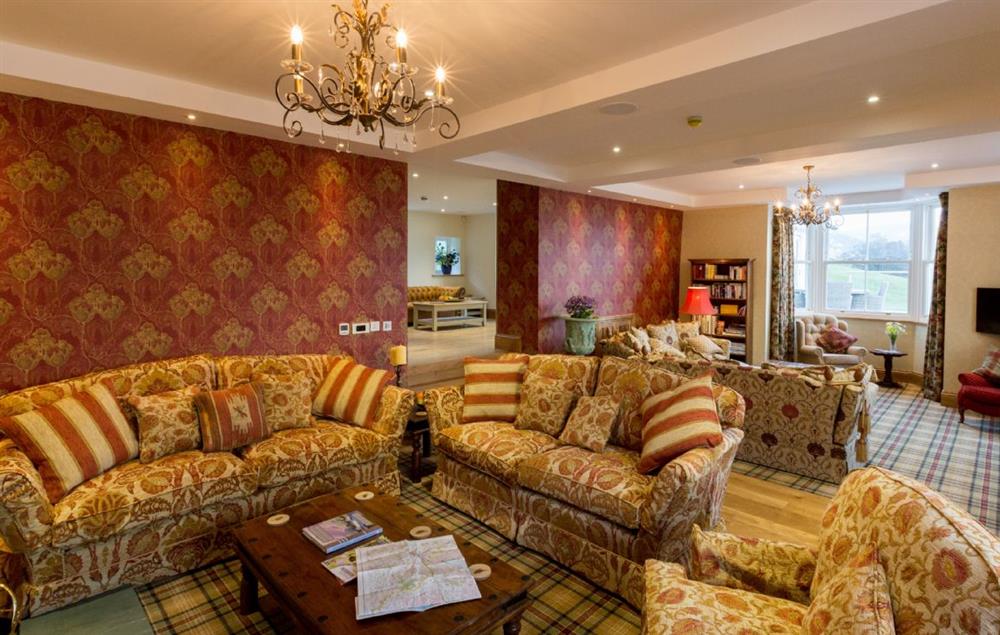 Ground floor: Drawing room with wood burning stove at Waternook, Ullswater