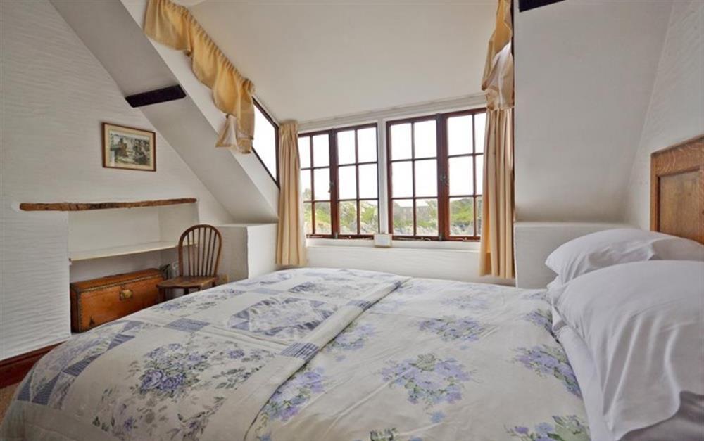 The delightful double bedroom on the second floor at Waters Edge in Polperro
