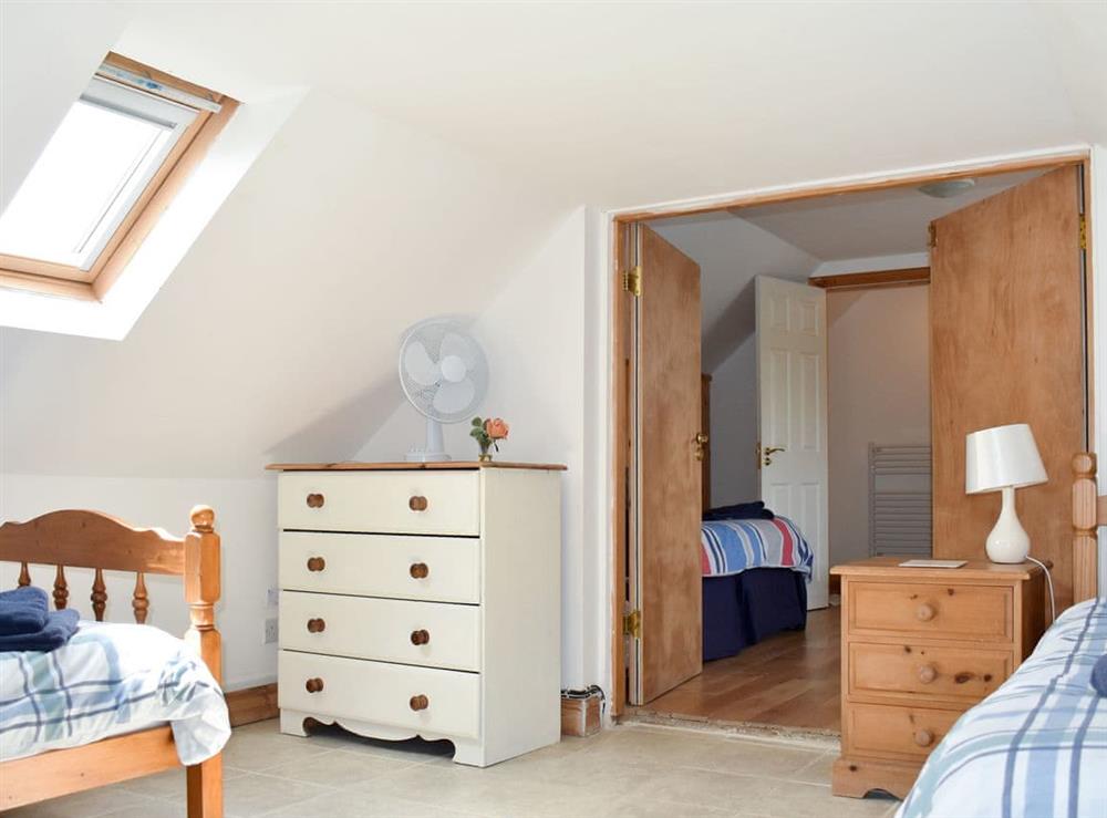 Triple bedroom with accessed via to the twin bedroom at Waters Reach in Kings Lynn, Norfolk